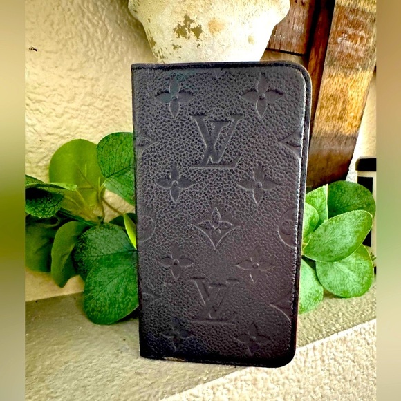 Louis Vuitton Monogram Empreinte Folio case for an iPhone X. /xs - Picture 1 of 13